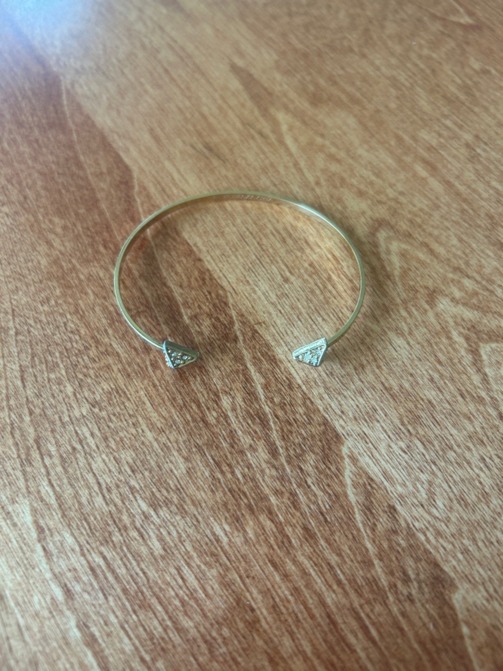 BCBGMaxAzria gold colored bracelet